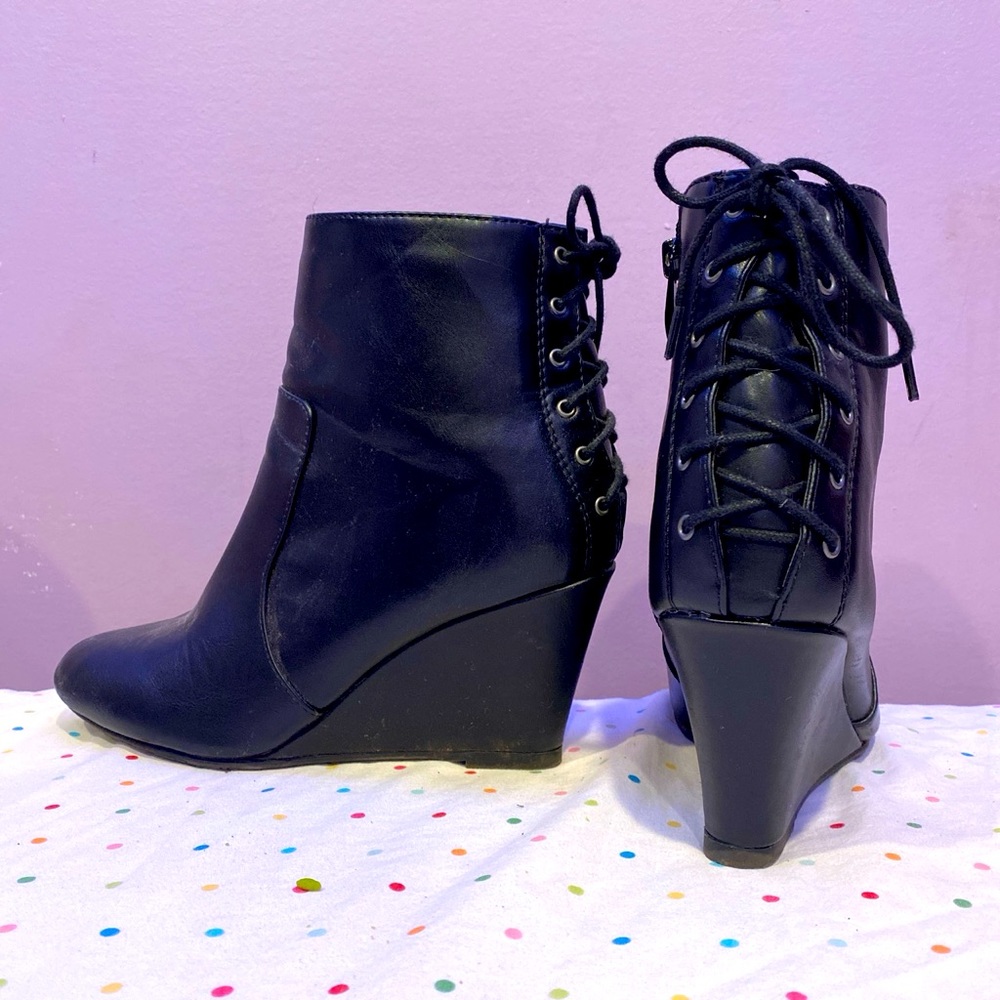 High heel black leather boots,used few times, good condition,heel 3 inches tall.